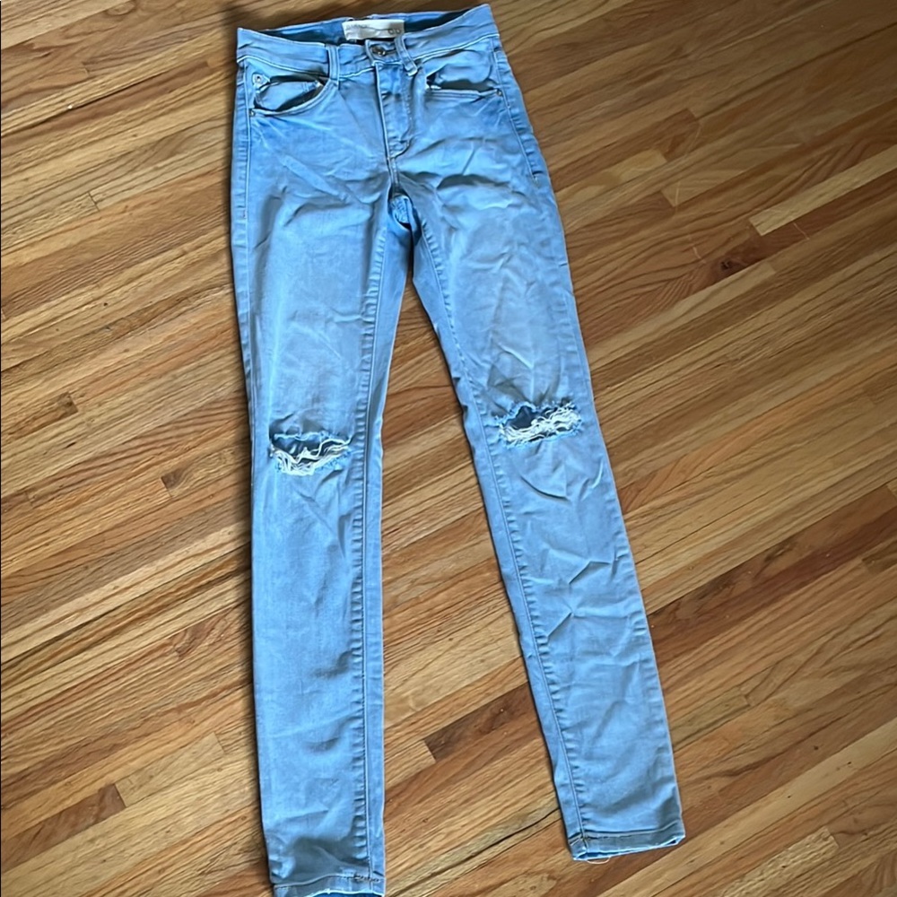 Women's Light Blue Distressed Jeans